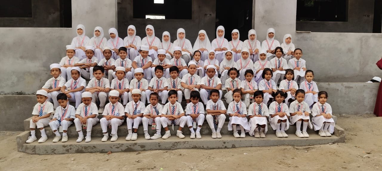Students in white uniforms – group photo