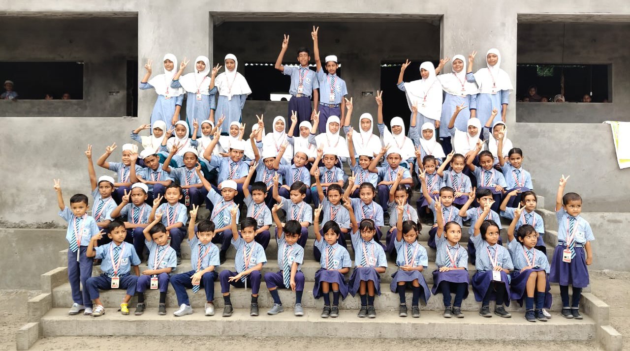 Students celebrating – victory sign